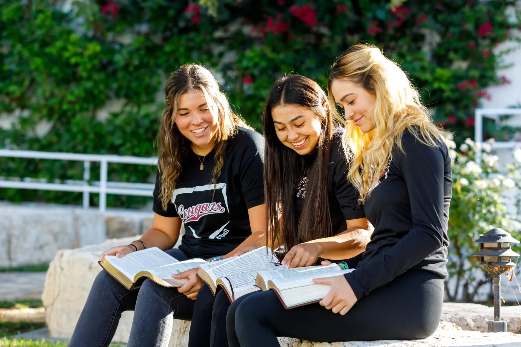 students reading their bibles together