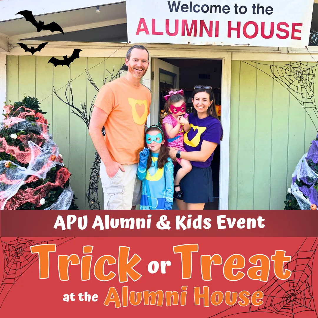 Family in front of the Alumni House