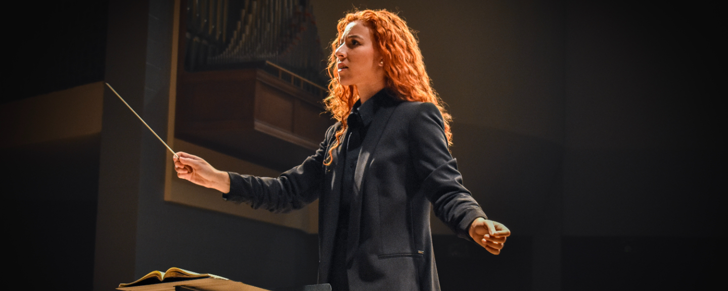 Raphaela conducting