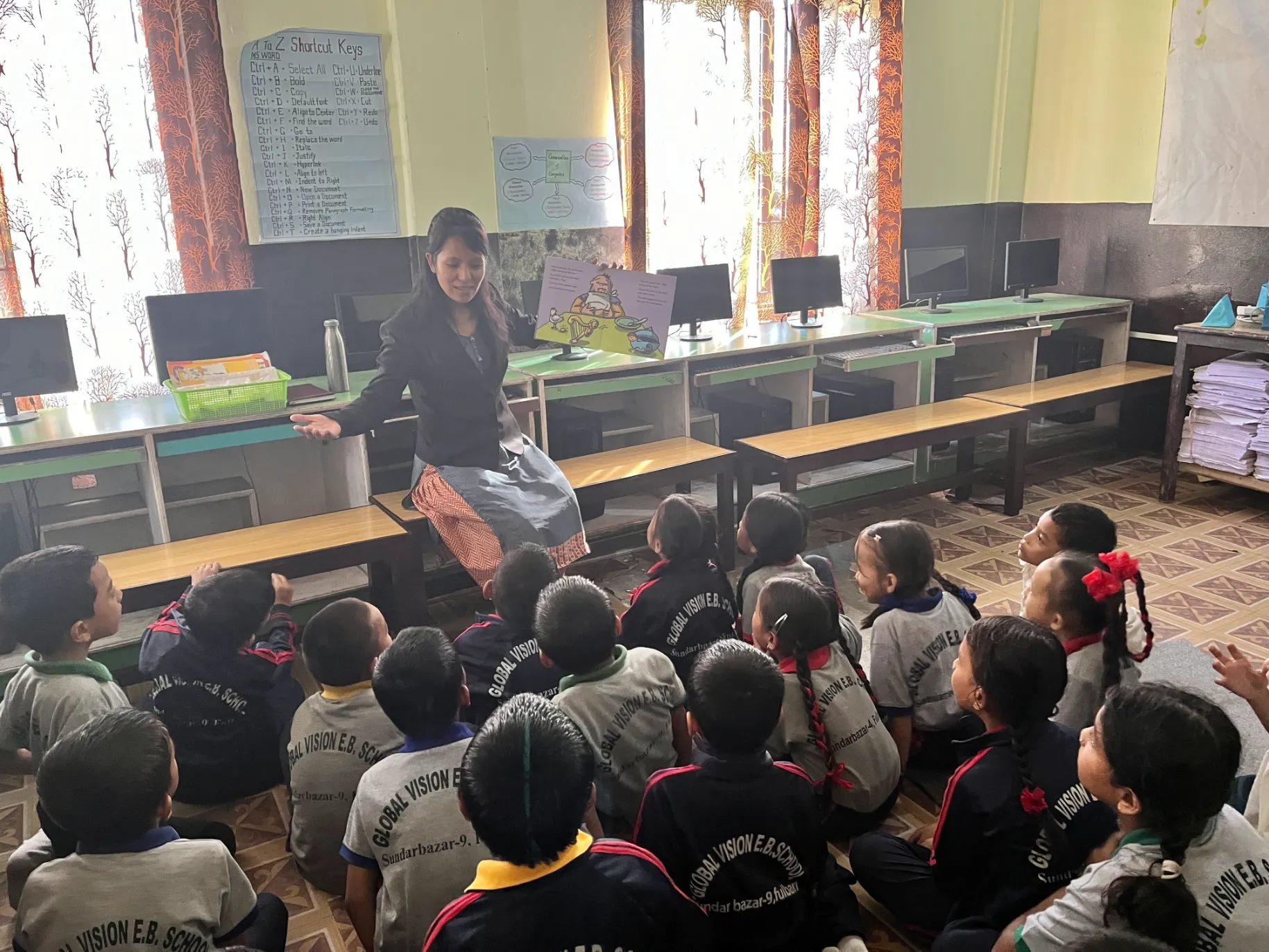 Anita teaches a classroom of kids.