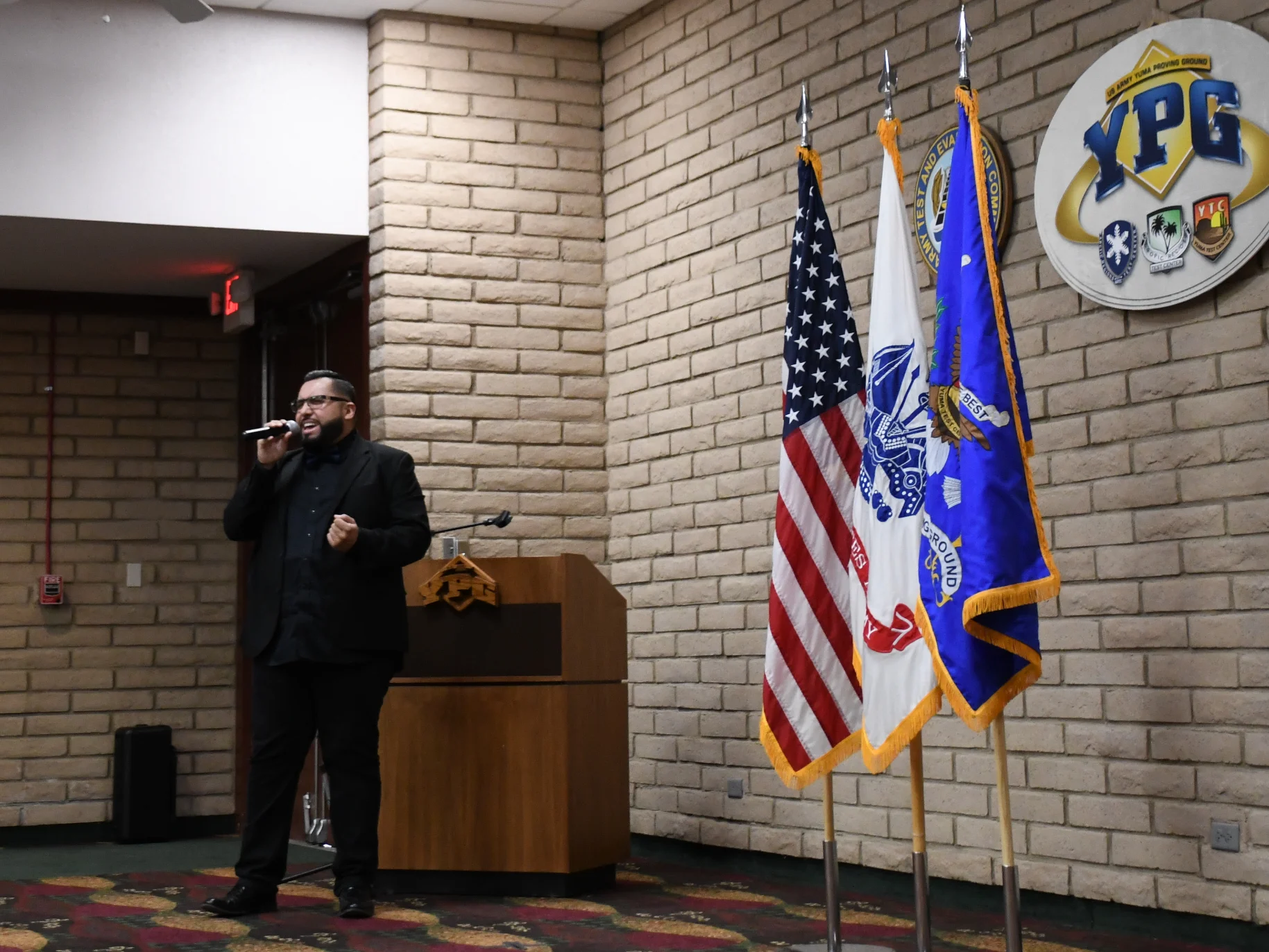 Carlos Garcia performs the national anthem