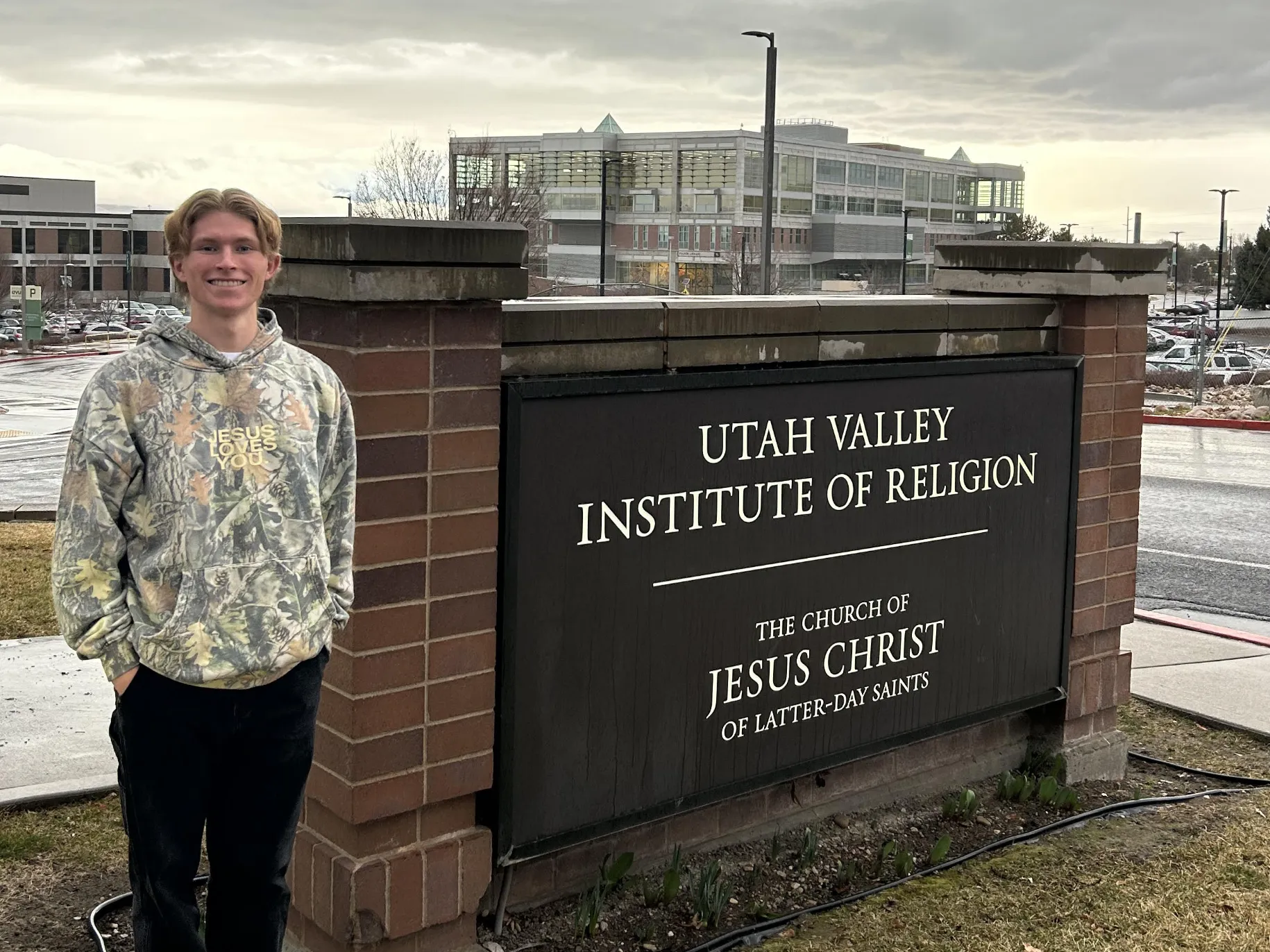 Ryder Burdett ’28 standing in front of Utah Valley Institute of Religion.