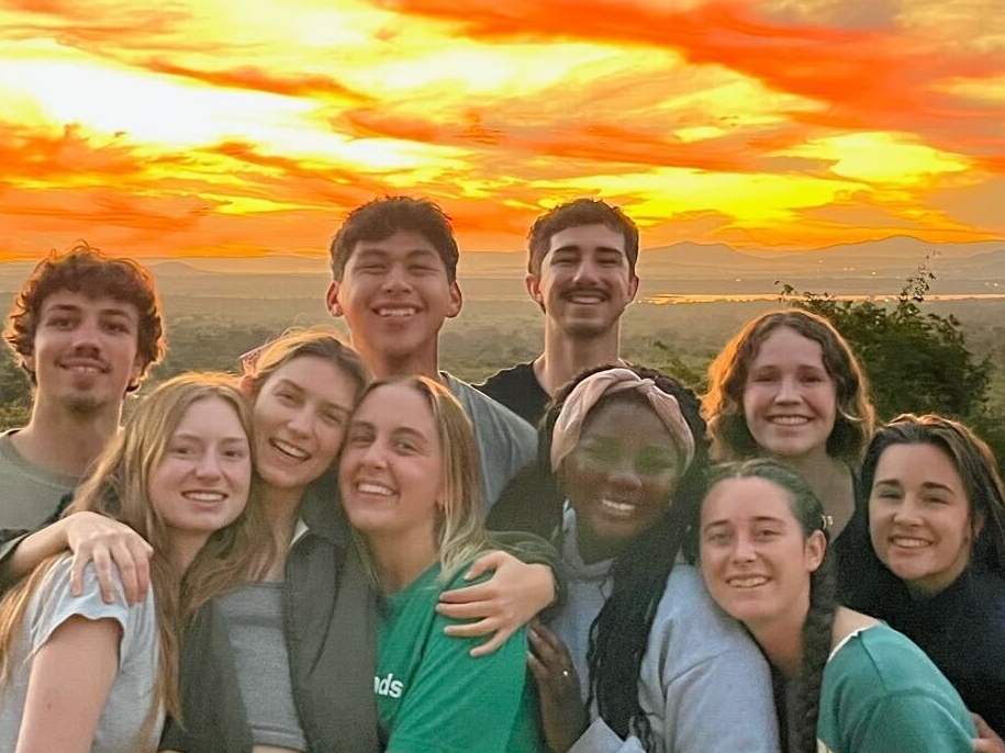 The South Africa Global Engagement team takes a group photo at sunset.