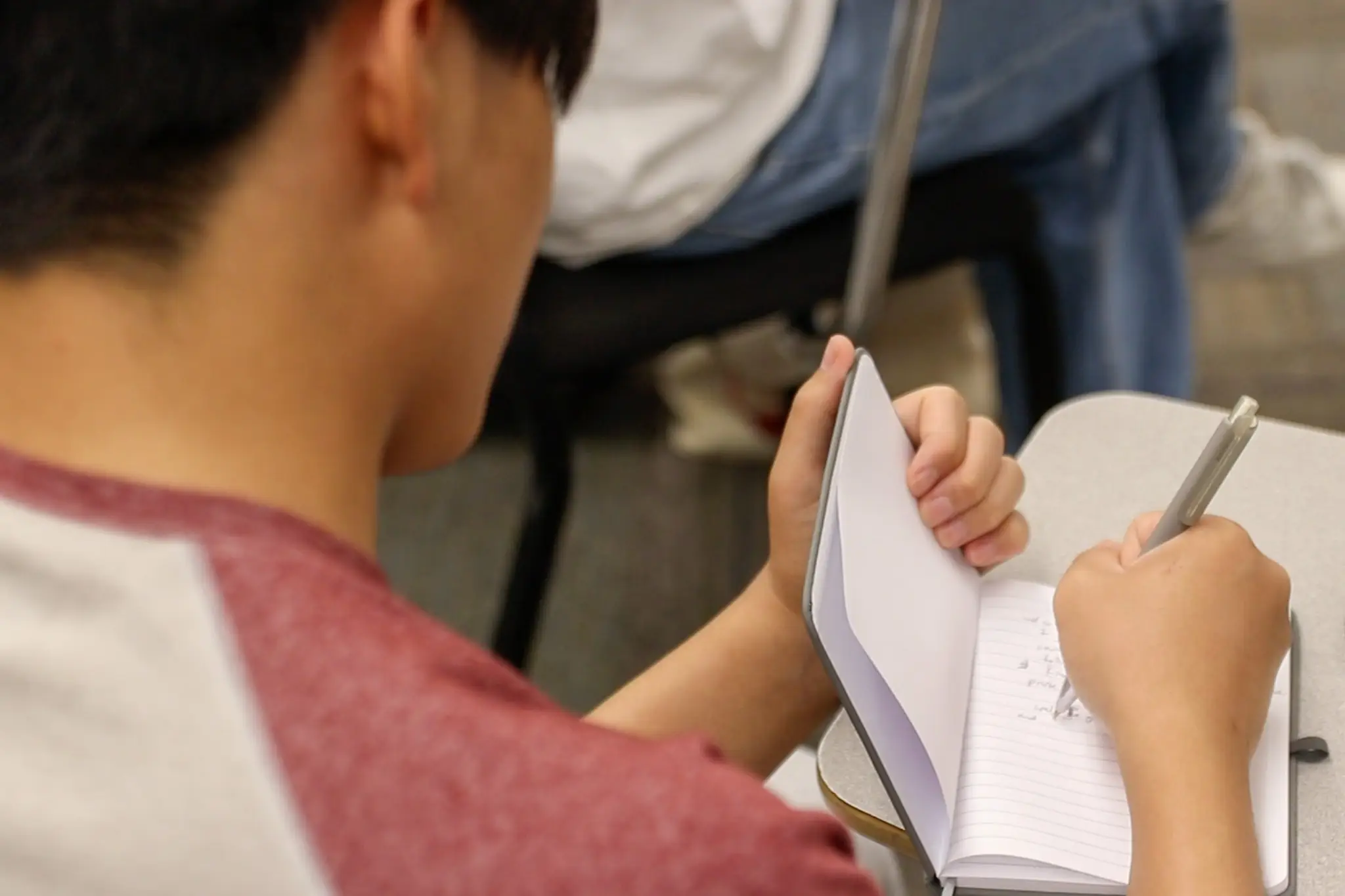 student writing a book