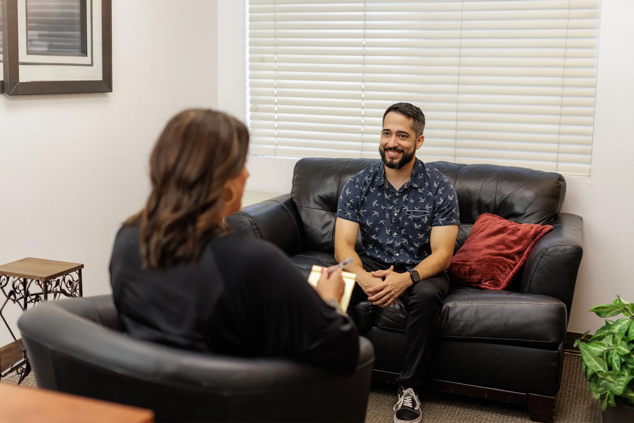 Therapist sitting across from a client