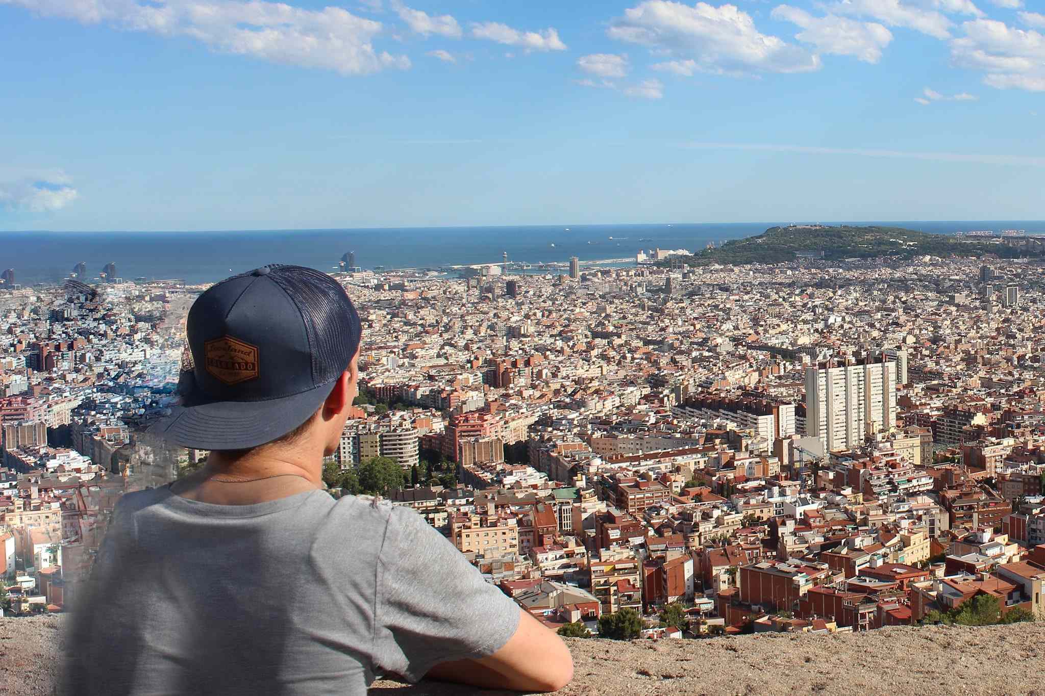Student overlooking a coastal city