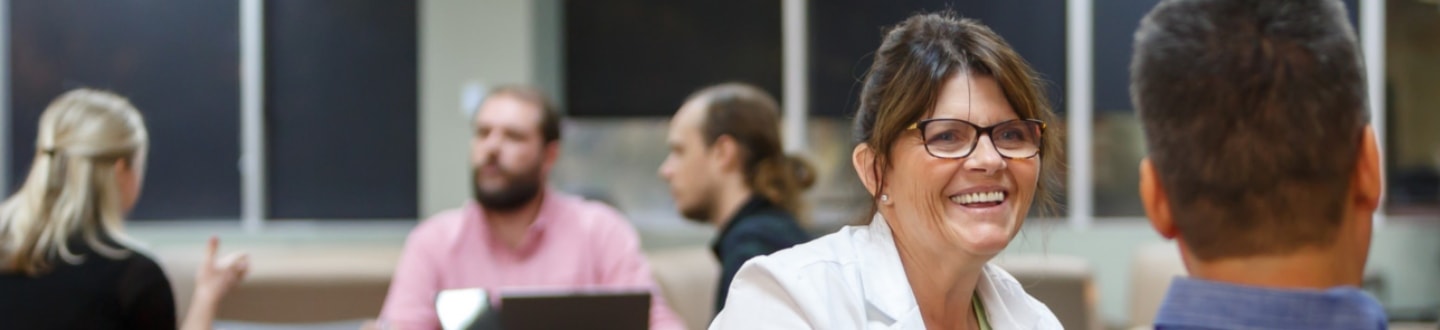 Nursing faculty member smiling