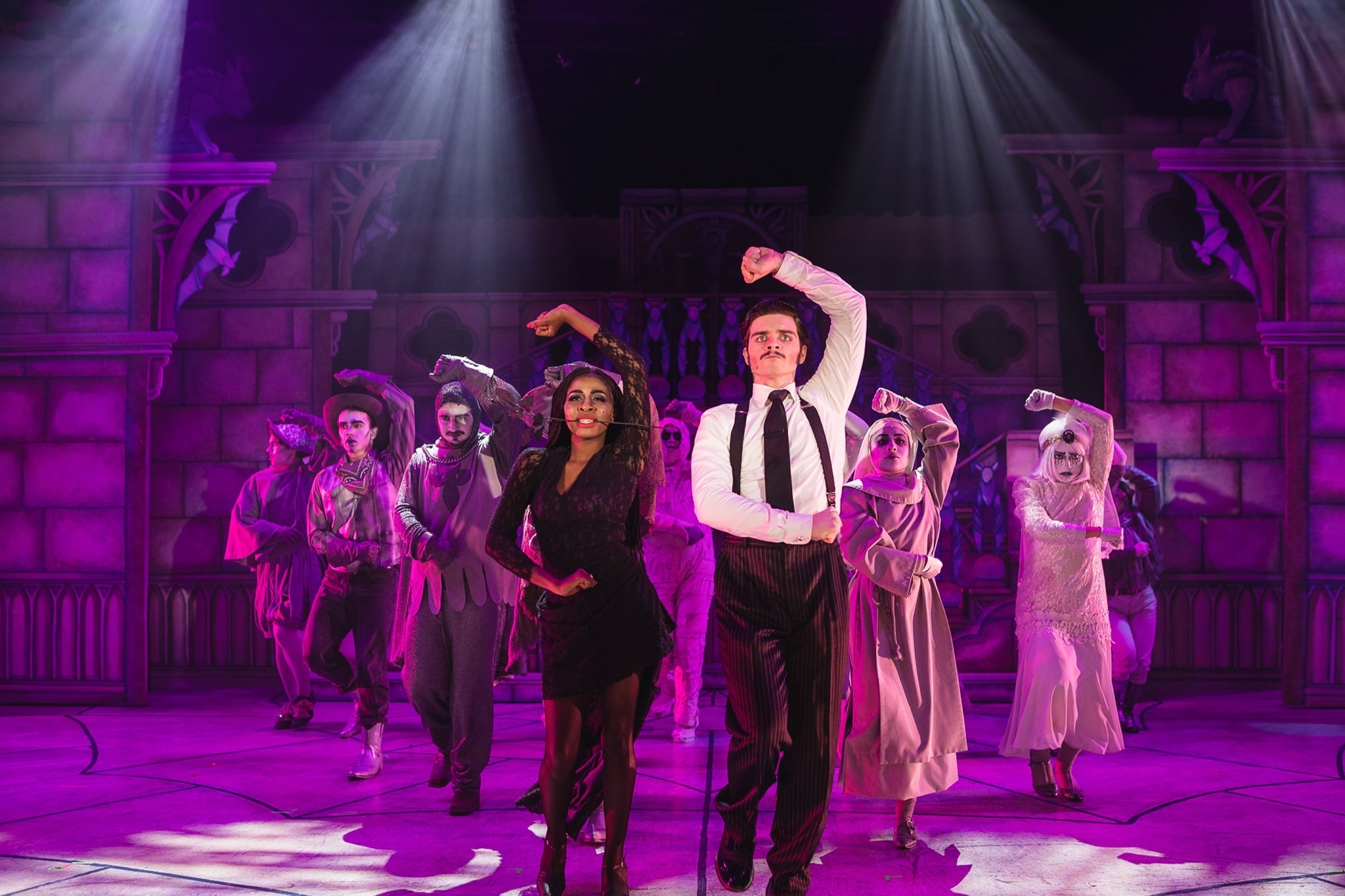 students performing on stage