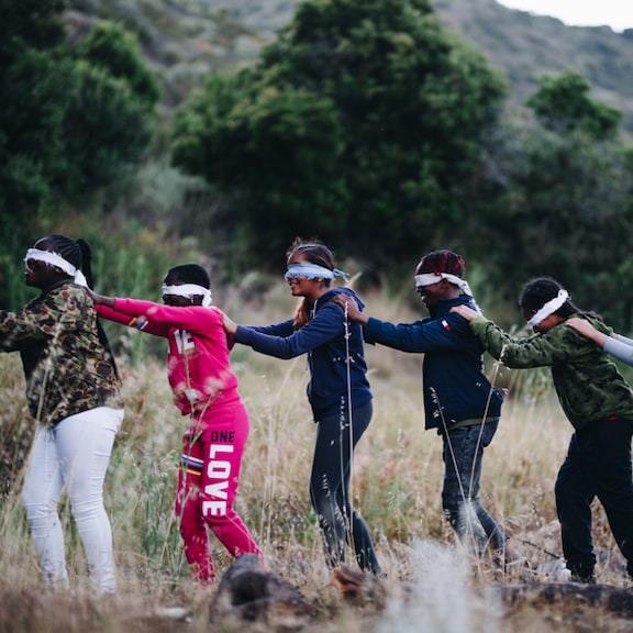 Blind folded people in a line