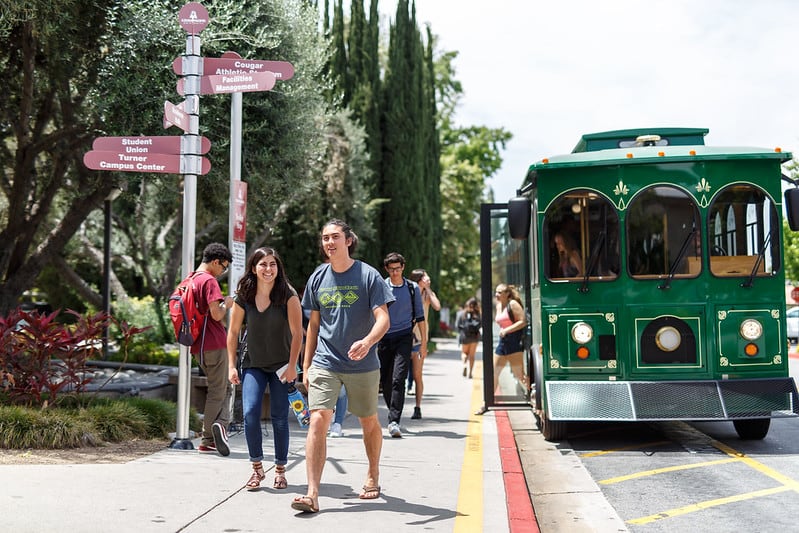 Students walking away from trolley