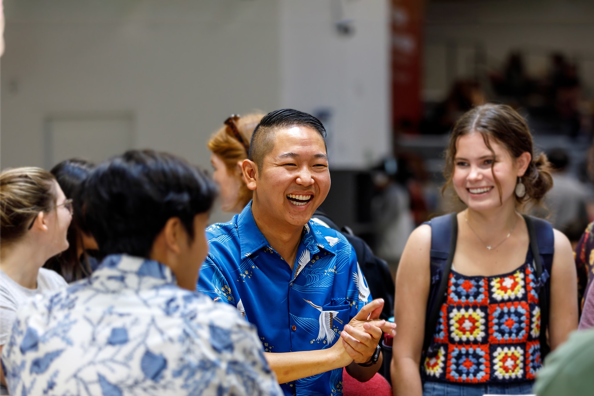 Students chatting with Curtis