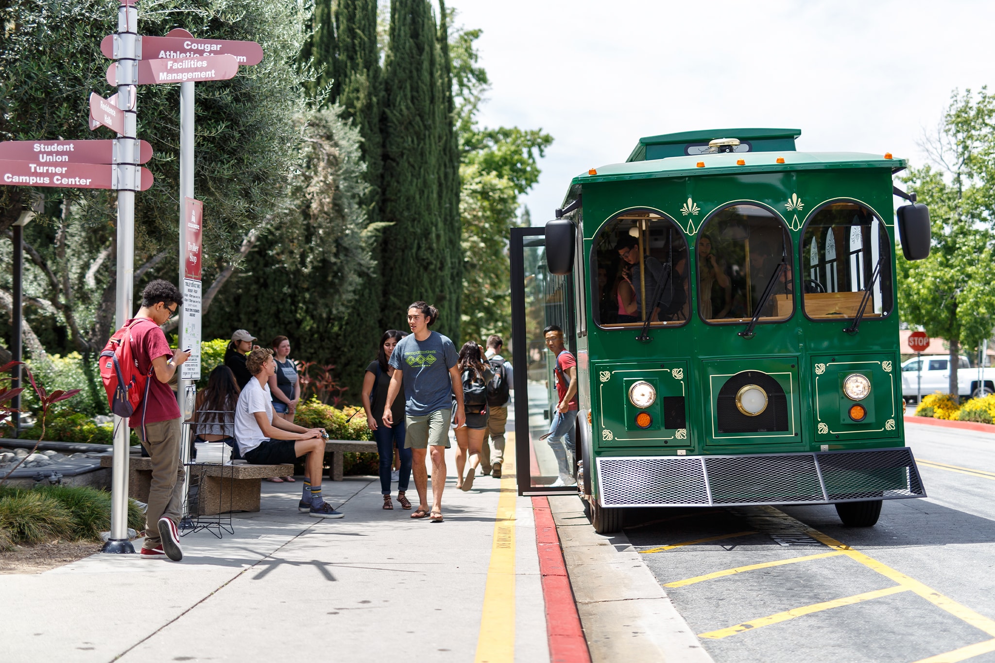 students hanging out with their laptops on east campus