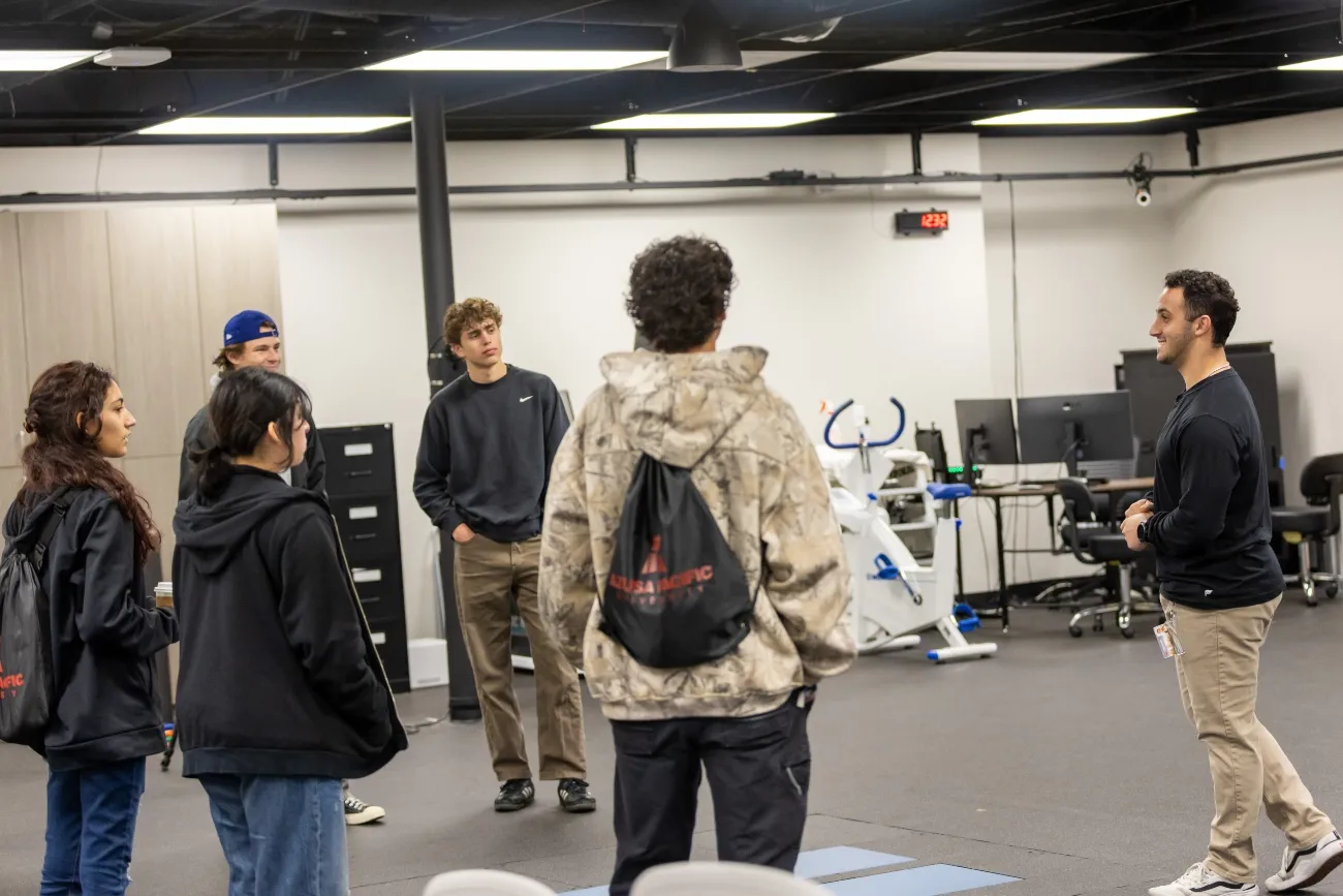Students listening to a professor inside a kinesioly classroom
