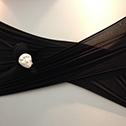 Tamara Valdry<br><em>Pressing Past Resistance</em>, 2014<br>Plaster cast, wood, fabric<br>6’8”x3’x11”